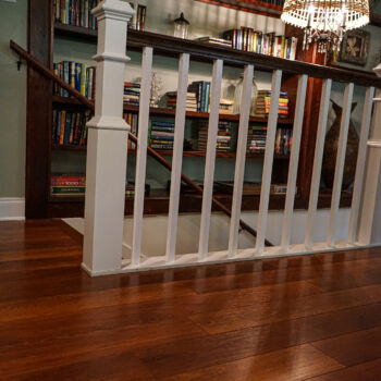 dark wood floors leading to stairway. Installed in Wimberley, Texas by GWH Flooring company