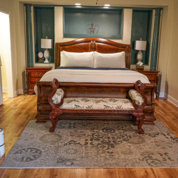 Wood floors in bedroom and bathroom installed in Wimberley, Texas by GWH Flooring company