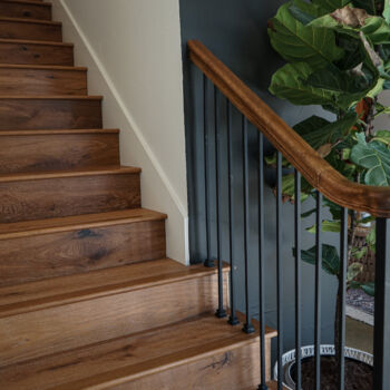 Beautiful classic wood staircase. Wood installed by GWH Flooring company