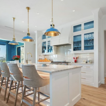 Kitchen in Driftwood with marble countertops and wood floors installed by GWH Flooring Store