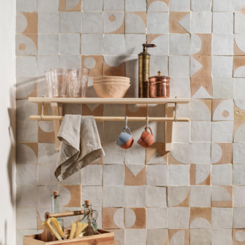 Fun patterned peach and beige Zellige moroccan tiles behind a kitchen counter. Tiles by Otto